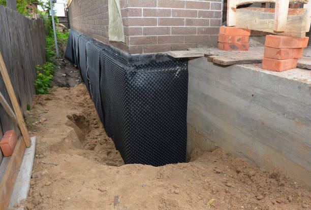 Happy homeowners after waterproofing job in Ho-Ho-Kus